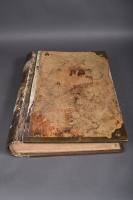 an old book sitting on top of a table