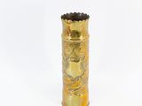 a gold vase with a black lid on a white background
