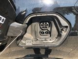 a close up of a car ' s fuel pump with a sticker on it