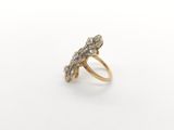an image of a gold and diamond ring on a white background