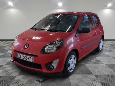 a picture of a red car parked in a garage