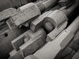 many pieces of wood that are laying on the ground