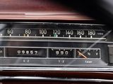 a close up of a car dashboard with a clock on it