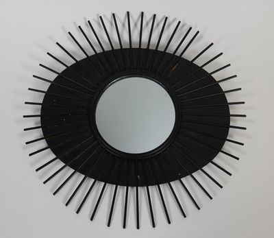 MIROIR Soleil en métal laqué noir.