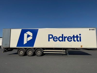 a semi truck that is parked in a parking lot