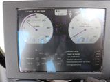 a close up of a car dashboard with a speedometer and gauges