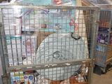 boxes of diapers are stacked on top of a cart in a warehouse