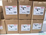 boxes stacked on top of each other with labels on them