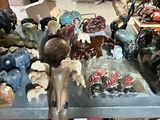 many figurines that are sitting on a table