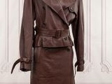 a brown leather trench coat on a mannequin mannequin mannequin mannequin mannequin mannequin mannequin mannequin mann