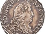 une pièce d'argent portant une tête de femme et une couronne