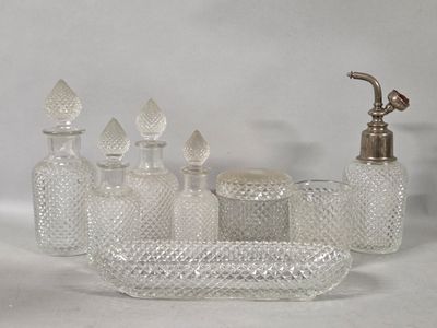 a lot of glass items that are sitting on a table
