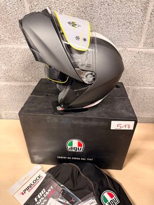 a helmet that is sitting on top of a box