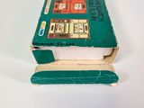 a small book that is sitting on top of a book