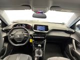 the interior of a car with a dash board and a steering wheel