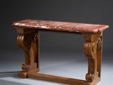 an old wooden table with a marble top on a gray surface