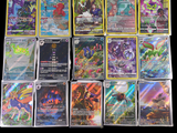 a lot of pokemon cards on a black background