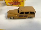 a small toy car that is sitting on a table