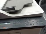 a printer that is sitting on top of a printer