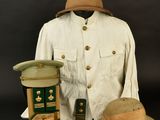 an image of a uniform and hat are displayed on a black background