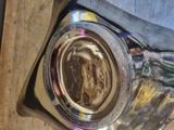 a silver ring with a picture of a woman on it