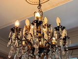 a chandelier hanging from the ceiling in a room