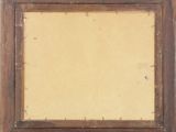 an old picture frame with a brown wood frame and a white background