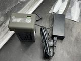 a power supply and a charger sitting on a table