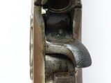 an old gun with a metal handle on a white background
