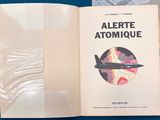 an open book with a picture of an airplane on it