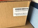 two boxes that are stacked on top of each other