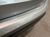 a close up of the front bumper of a car