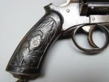 a gun that is sitting on top of a table