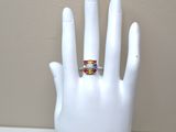a ring on a mannequin hand with a ring on it