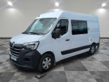 the white van is parked on a checkered floor in a room