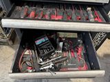many tools that are in the drawer of the oven