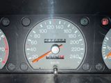 a close up of a speedometer on a car