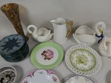 a lot of plates and cups on the table