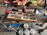 a table that has a bunch of books on it