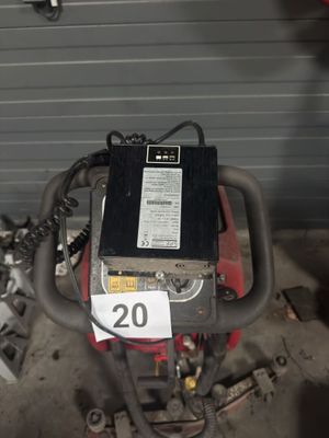 an image of a small engine in a garage