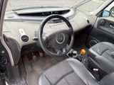 a car dashboard with a steering wheel and a dash board