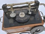 an old fashioned telephone that is sitting on a table