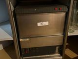 an image of a kitchen appliance that is in a cabinet