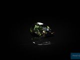 une tourmaline verte posée sur un fond noir