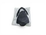 black leather shoulder bag on a gray pillow on a white background