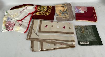 many different types of cloths laid out on a table
