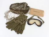 a pair of gloves, goggles and a net on the ground