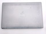 a dell laptop that is sitting on a table