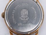 an image of a close up of a watch on a white surface
