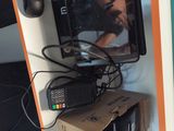 a television that is sitting on top of a cardboard box